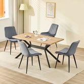 Chaise de salle à manger gris foncé avec revêtement en velours et pieds en métal.