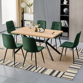 Chaise de salle à manger vert foncé en velours hollandais avec pieds en métal.