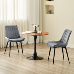 Chaise de salle à manger gris foncé avec revêtement en velours et pieds en métal.