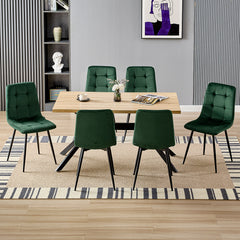 Chaise de salle à manger vert foncé en velours hollandais avec pieds en métal.