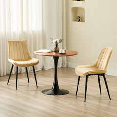 Chaise de salle à manger Champagne avec revêtement en velours et pieds en métal.
